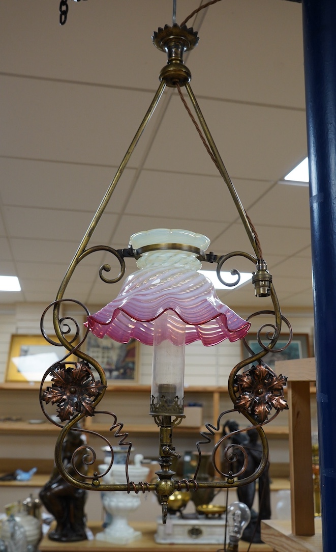 An English Arts and Crafts gas pendant with Vaseline cranberry cylinder shade, including pendant wire, c.1880's-1910, wired, 78cm high, 38cm wide. Condition - good, not tested